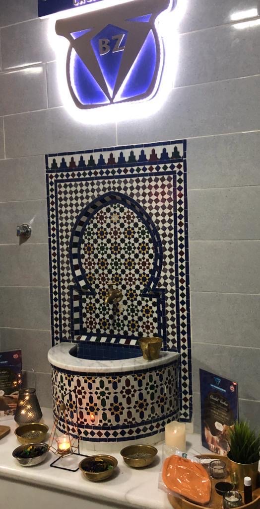 Hammam Ziani Casablanca traditional fountain with BZ branding