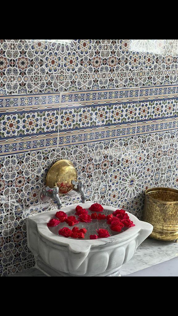 Hammam Ziani Casablanca marble sink with rose petals