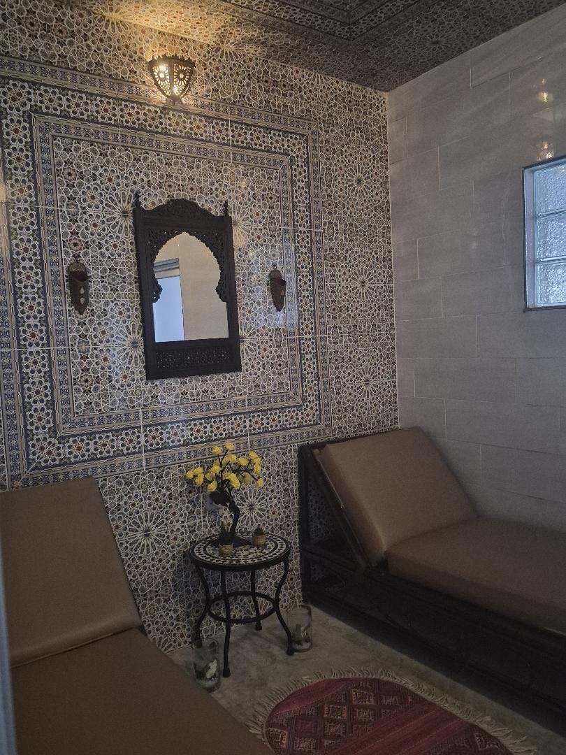 Hammam Ziani Casablanca zellige tiled relaxation room